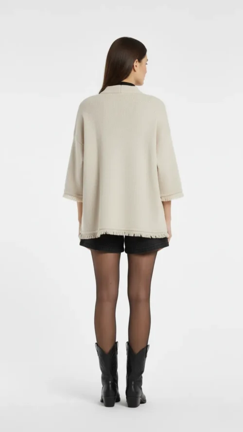 Veste en maille col officier et finition franges